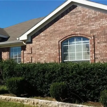Rent this 3 bed house on 603 White Swan Dr in Arlington, Texas