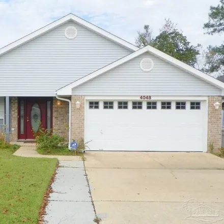 Rent this 3 bed house on 4052 Embers Landing in Brent, FL 32505