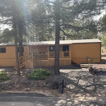 Buy this studio apartment on 2401 West Savage in Show Low, AZ 85901