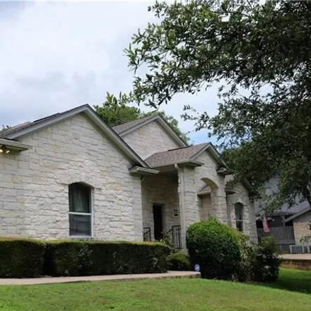 Rent this 4 bed house on 11207 Taterwood Drive in Austin, TX 78750