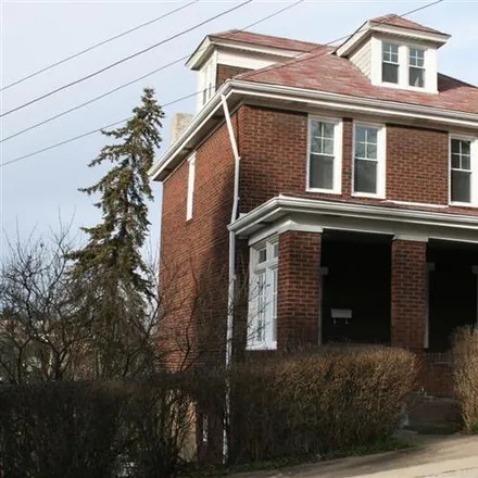 Rent this 3 bed house on 2915 Roland Ave