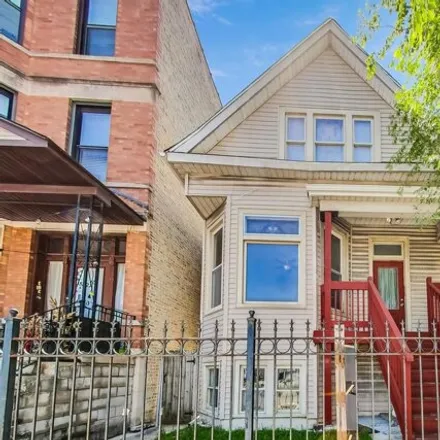Buy this 8 bed house on 3609 West Diversey Avenue in Chicago, IL 60618