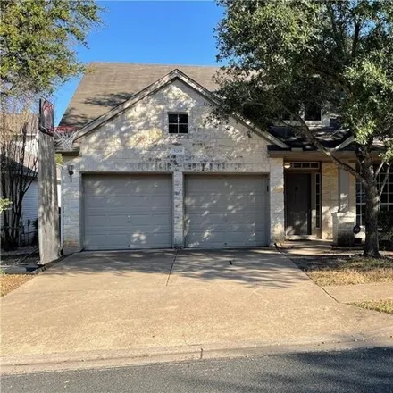 Rent this 4 bed house on 5208 Scottish Thistle Drive in Austin, TX 78739