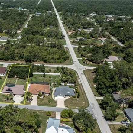 Image 4 - 1025 Cabot St E, Port Charlotte, Florida, 33953 - House for sale