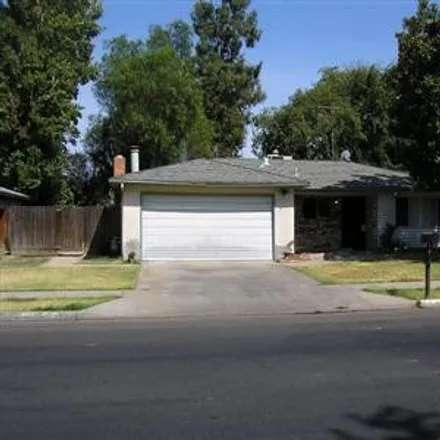 Rent this 3 bed house on 4696 North Hughes Avenue in Fresno, CA 93705