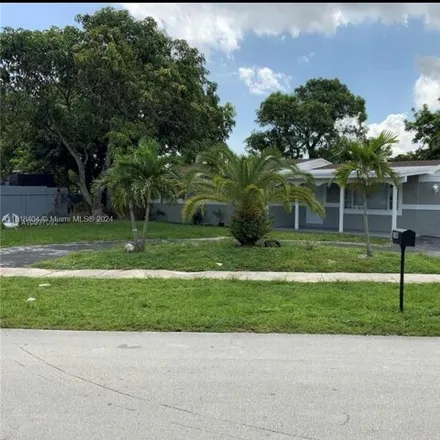 Rent this 4 bed house on 1074 Northwest 18th Court in Middle River Vista, Fort Lauderdale