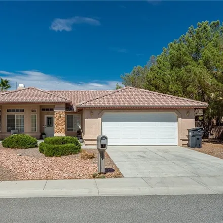 Buy this 3 bed house on 1942 South Vineyard Drive East in Pahrump, NV 89048