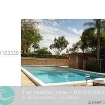 Rent this 3 bed condo on unnamed road in Coral Springs, FL 33065