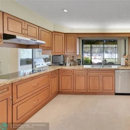 Buy this 4 bed house on 754 Northwest 101st Terrace in Coral Springs, FL 33071