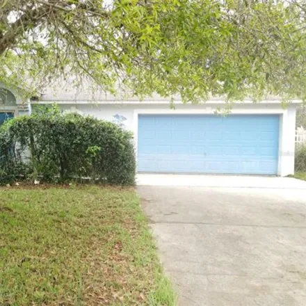 Buy this 3 bed house on 86 Pine Tree Drive in Palm Coast, FL 32164