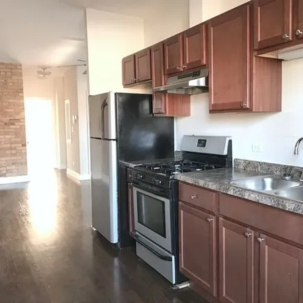 Rent this 2 bed apartment on 1552 W Thome Ave