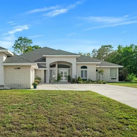 Buy this 4 bed house on 10234 Loretto Street in Hernando County, FL 34608