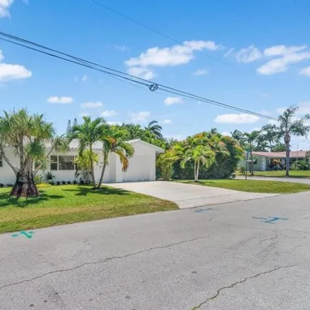 Buy this 3 bed house on 2656 Northeast 17th Street in Country Club Isles, Pompano Beach