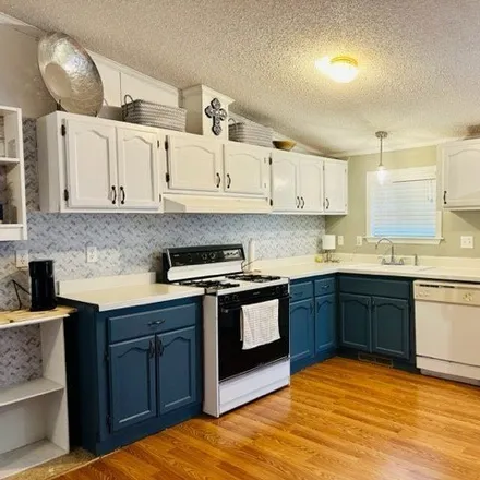 Buy this studio apartment on 1309 Nottingham Dr in Northville, Michigan