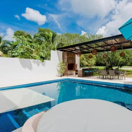Rent this 5 bed house on Puerto Aventuras Golf Course in Calle Bahía Yalten, 77750 Puerto Aventuras