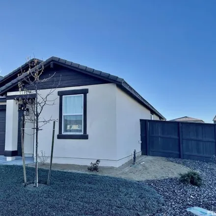 Buy this 4 bed house on 1905 Zidane Drive in Sparks, NV 89436