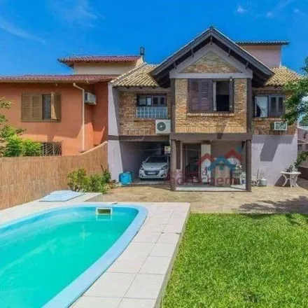 Buy this 4 bed house on Rua Porto Seguro in Nossa Senhora das Graças, Canoas - RS