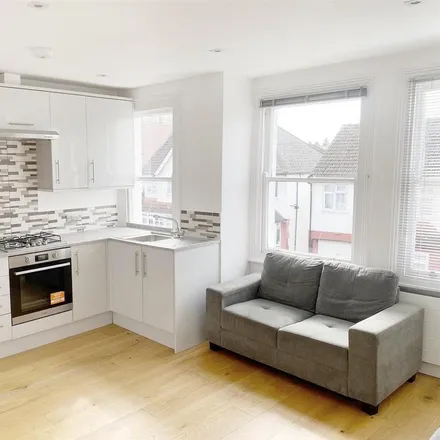 Rent this 2 bed townhouse on Russell Road in The Hyde, London