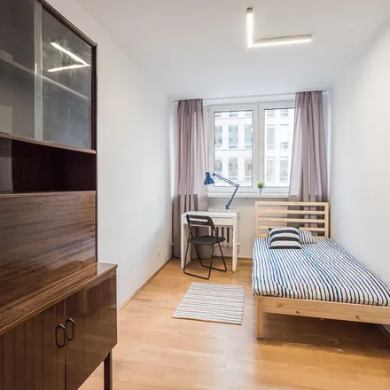 Rent this 3 bed room on Antoniego Malczewskiego 48/50 in 02-622 Warsaw, Poland