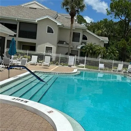 Rent this 2 bed condo on Emerald Woods Drive in Collier County, FL 34108