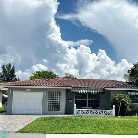 Rent this 2 bed house on 6119 Northwest 67th Way in Tamarac, FL 33321