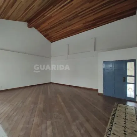 Rent this 3 bed house on Rua Taquari in Cristal, Porto Alegre - RS