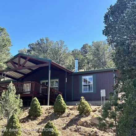 Buy this studio apartment on 222 Goodnight Loving Trail in Lincoln County, NM 88255