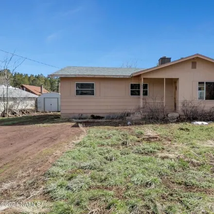 Buy this 2 bed house on 1367 Romney Avenue in Mountian Dell, Flagstaff