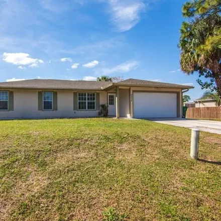 Buy this 5 bed house on 2220 Southwest Chateau Terrace in Port Saint Lucie, FL 34953
