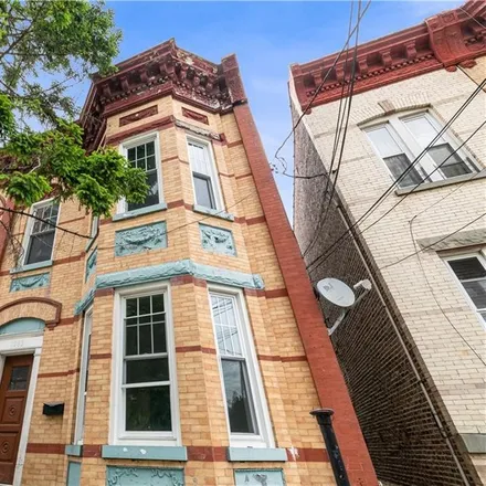 Buy this 5 bed townhouse on 1077 East 34th Street in New York, NY 11210