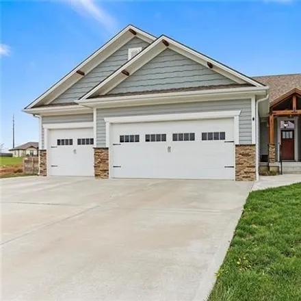 Buy this 4 bed house on 901 Moore Place in Odessa, MO 64076