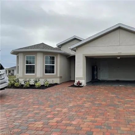Rent this 3 bed house on 126 Tropicana Parkway West in Cape Coral, FL 33993