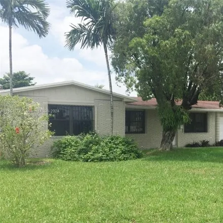 Rent this 3 bed house on 1120 West 64th Street in Palm Springs Estates, Hialeah