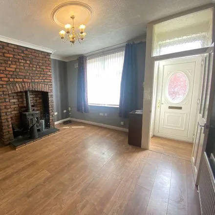 Rent this 2 bed townhouse on Thornley Street in Middleton, M24 2HX