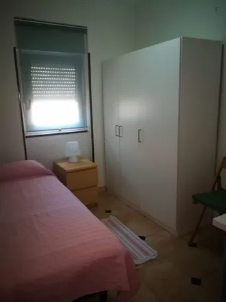 Rent this 4 bed room on Madrid in Calle de la Encomienda de Palacios, 47