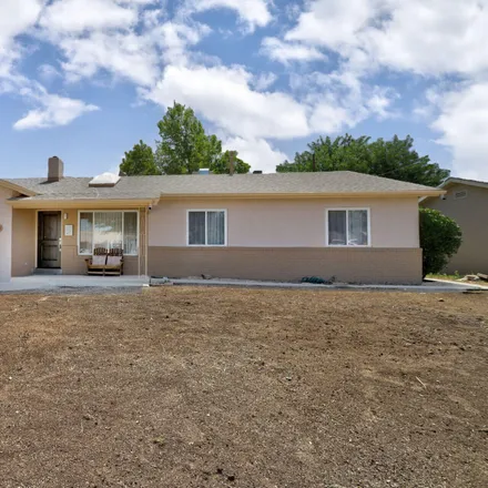 Buy this 4 bed house on 2916 Cardenas Drive Northeast in Albuquerque, NM 87110