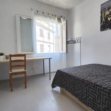 Rent this 4 bed room on Centre de Salut República Argentina in Carrer dels Sants Just i Pastor, 46021 Valencia