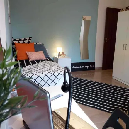 Rent this 6 bed room on Via Rocca D'Anfo prima del n 7 in Via Rocca d'Anfo, 25128 Brescia BS