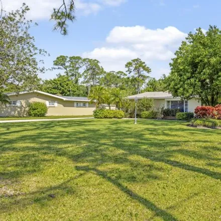 Buy this 4 bed house on 8428 Sylvan Drive in West Melbourne, FL 32904