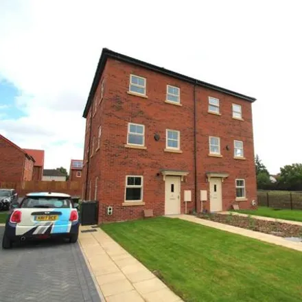 Rent this 2 bed townhouse on Kentmere Approach in Leeds, LS14 1FG