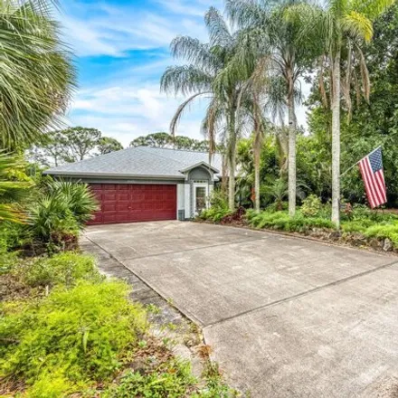 Buy this 3 bed house on 2539 Diane Avenue Southeast in Palm Bay, FL 32909