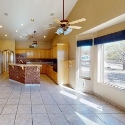 Buy this 4 bed apartment on 10490 East Sky High Drive in Groves Lincoln Park, Tucson
