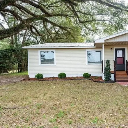 Buy this 5 bed house on 2377 Austin Drive in Dougherty County, GA 31721