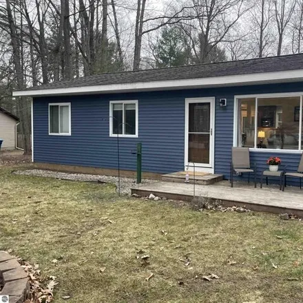 Buy this 3 bed house on 865 Cedar Trail in Green Lake Township, Grand Traverse County