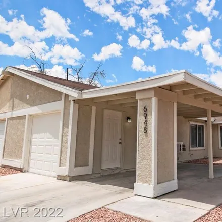 Buy this 2 bed townhouse on 6932 Royal Meadow Place in Spring Valley, NV 89147