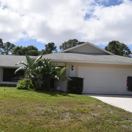 Rent this 3 bed house on 744 Southeast Starflower Avenue in Port Saint Lucie, FL 34983