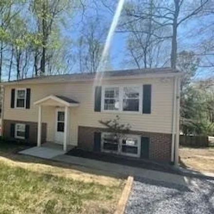 Rent this 3 bed house on 6123 Oak Grove Drive in Leavells, VA 22407