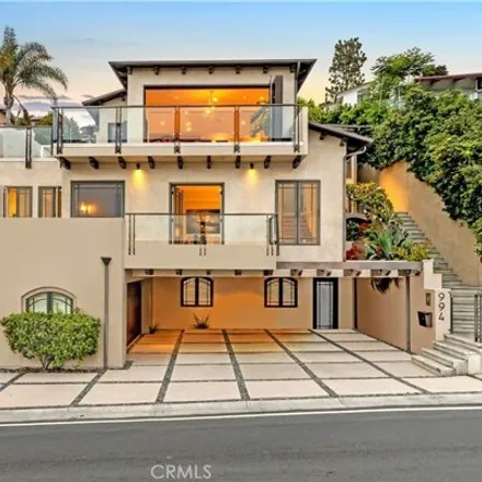 Rent this 4 bed house on 994 Temple Hills Drive in Laguna Beach, CA 92651