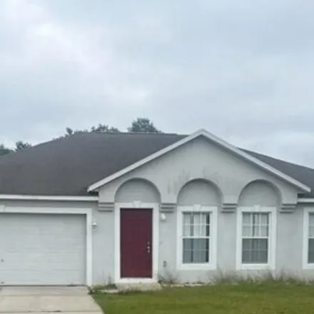 Rent this 4 bed house on 400 Adriel Avenue in Polk County, FL 33880