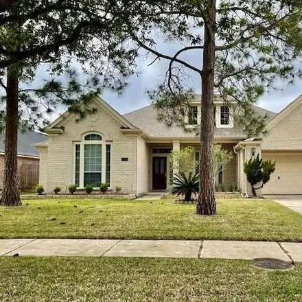 Buy this 4 bed house on 1124 Rustling Wind Lane in League City, TX 77573